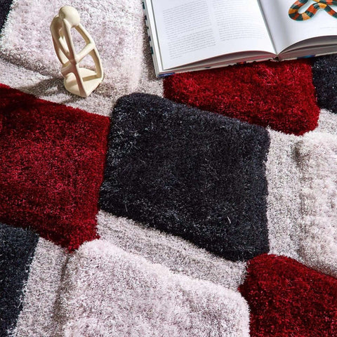 Tapis géométrique 3D rouge à poils longs