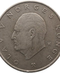Silver coin with a profile of a person and text 'OLAV V NORGES KONGE' on a white background