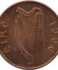 Copper coin with a harp design and 'Eire' text, dated 1996.