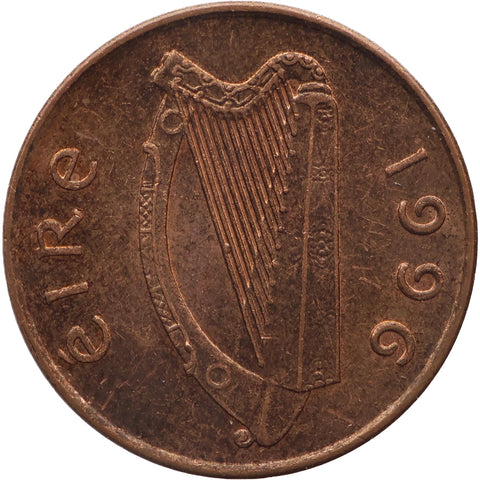 Copper coin with a harp design and 'Eire' text, dated 1996.