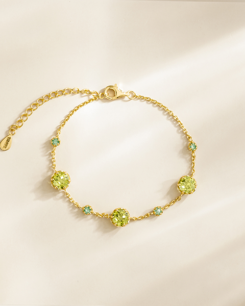 Bracelet en vermeil or 18 carats avec émeraude et péridot