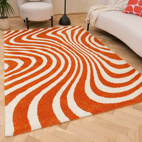 Joli tapis rayé orange et blanc