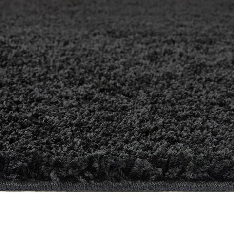 Waschbarer schwarzer Shaggy-Teppich