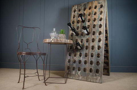 Reclaimed wine bottle riddler stands