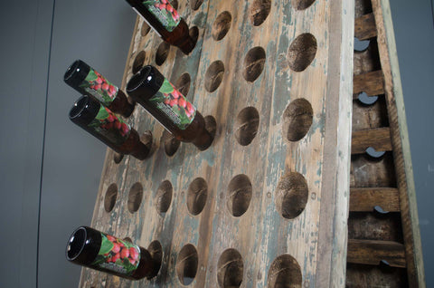 Reclaimed wine bottle riddler stands