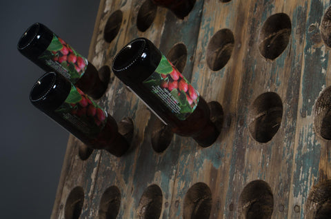 Reclaimed wine bottle riddler stands