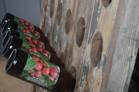 Reclaimed wine bottle riddler stands