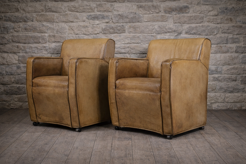 Pair of mid century leather chairs