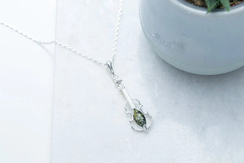 Boucles d'oreilles violon en ambre vert