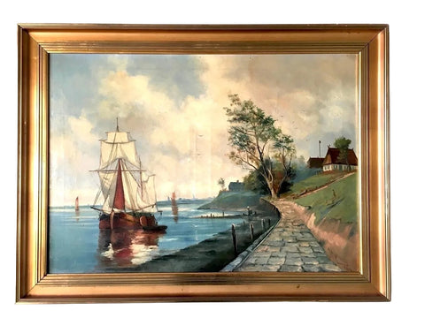 Framed painting of a sailboat on a river with a path and trees in the background