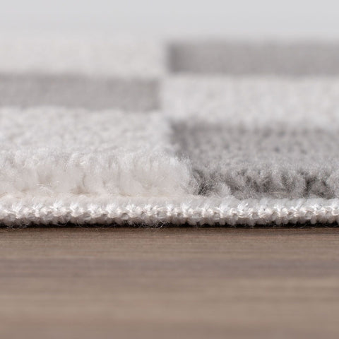 Tapis gris à damier Loft