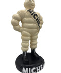 Michelin Man figure on a white background