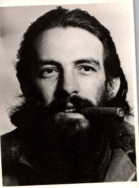 Perfecto Romero (1939–) - Camilo Cienfuegos smoking Cigar Cuban Commander 1959