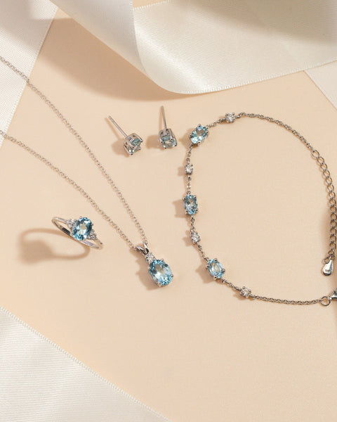 Essentielles Schmuckset mit blauem Topas in Sterlingsilber