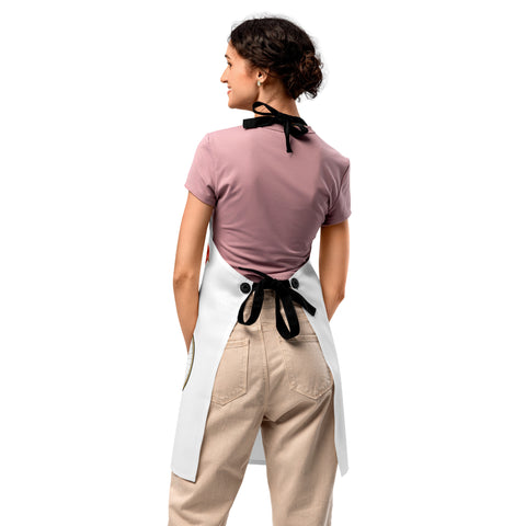 Plain reverse of the white Chicken on a Bicycle kitchen apron, showing black twill ties and fasteners