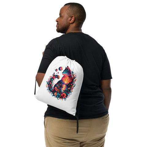 Psychedelic Sunset Cat drawstring backpack with full colourful cat, lake, flowers and planet illustration