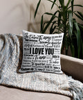 Love in Every Language 18-inch premium white pillow with large black multilingual typography – front room view