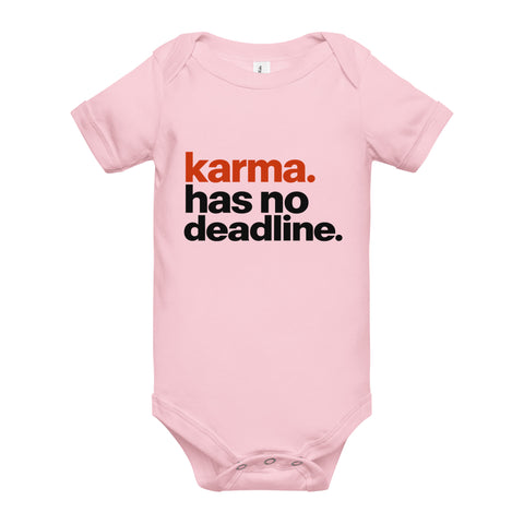 Pink baby bodysuit with original rust-orange and black Karma Has No Deadline lettering on the front – ZIPZAPPA