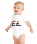 White baby bodysuit with original rust-orange and black Karma Has No Deadline lettering on the front – ZIPZAPPA