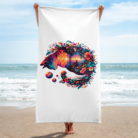 White 30 × 60 inch beach towel with original colourful Psychedelic Sunset Cat artwork centred on the front – beach mockup 2 – ZIPZAPPA