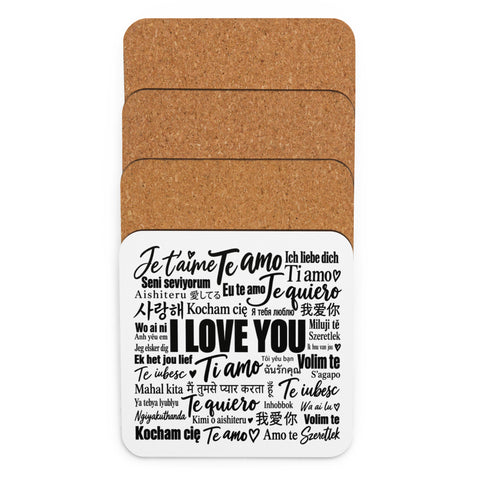 Stacked cork-back coasters with the Love in Every Language printed front visible.