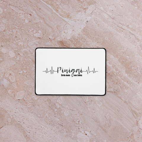 Money Pulse 12 × 18 inch desk mat with complete Lithuanian Pinigai lettering and black heartbeat line centred on white – view 2