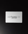 Money Pulse 12 × 18 inch desk mat with complete Lithuanian Pinigai lettering and black heartbeat line centred on white – view 3