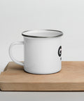White 12 oz enamel camping mug with a silver rim and original black GOD Find Him lettering with a red location pin, printed once on the front – ZIPZAPPA