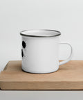 White 12 oz enamel camping mug with a silver rim and original black ink-splatter panda face centred on the front – ZIPZAPPA