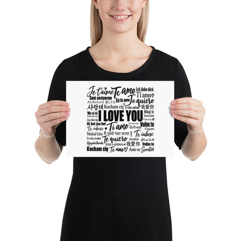 Love in Every Language multilingual typography on white 21 × 30 cm matte art poster – person holding the poster – ZIPZAPPA