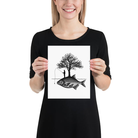 Model holding the Angler’s Island black-and-white matte poster featuring a fisherman, tree and giant fish