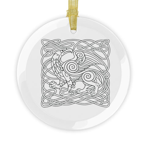 Round glass ornament with complete Celtic griffin knotwork design and gold hanging ribbon