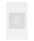 Golden Loop white hand towel with gold-tone geometric emblem on black square – plain white back