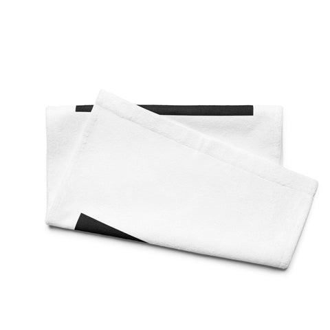 Golden Loop white hand towel with gold-tone geometric emblem on black square – alternate front view