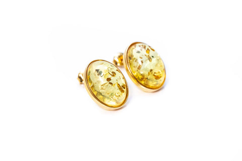 Boucles d'oreilles ovales à clous en ambre et or, motif agrumes.