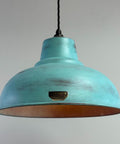 Turquoise pendant light with a brand logo on a gray background