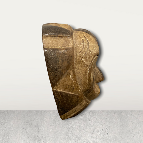 Small African mask on stand