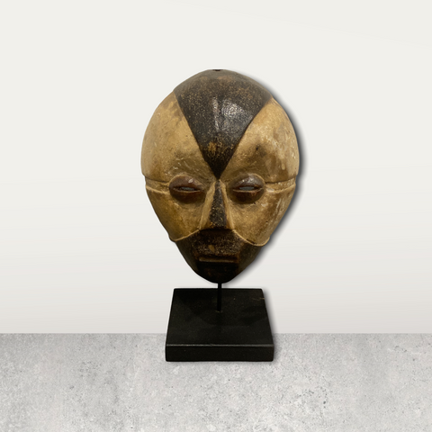 Small African mask on stand