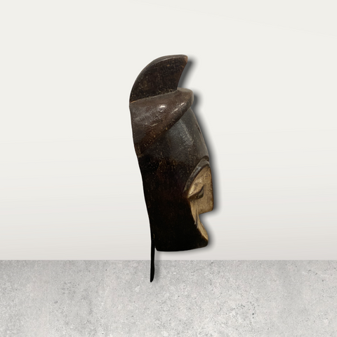 Small African mask on stands