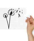 Dandelion Flight 110-piece jigsaw puzzle with metal tin, original silhouettes floating on dandelion seeds on white – view 3