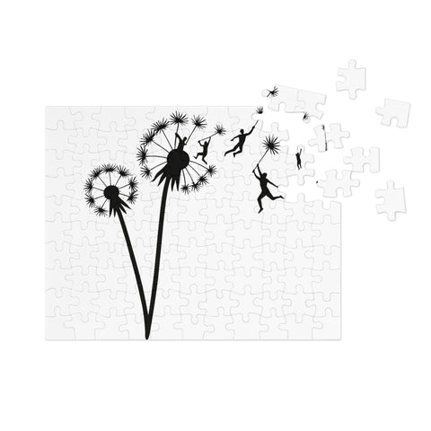 Dandelion Flight 110-piece jigsaw puzzle with metal tin, original silhouettes floating on dandelion seeds on white – view 2