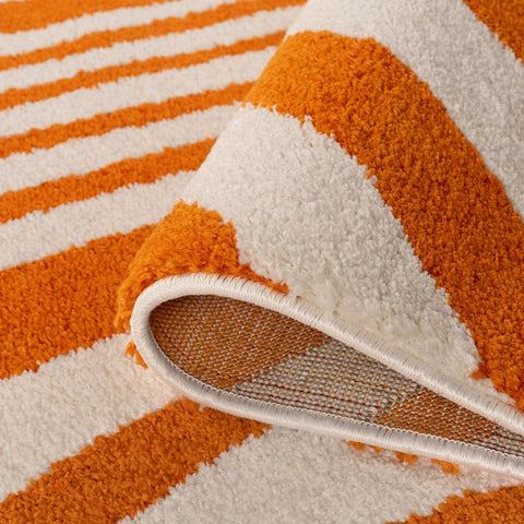 Joli tapis rayé orange et blanc