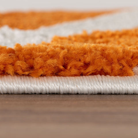 Joli tapis rayé orange et blanc