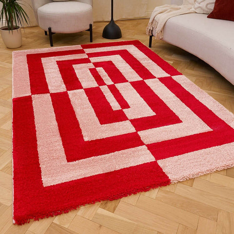 Joli tapis géométrique rouge et rose