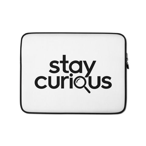 White 13-inch laptop sleeve with original Stay Curious magnifying-glass wordmark on the front – mockup 1 – ZIPZAPPA