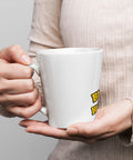 White Buddha Is My Homeboy latte mug held in both hands, viewed from the handle side.