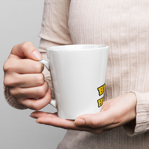 White Buddha Is My Homeboy latte mug held in both hands, viewed from the handle side.