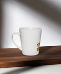 Left-side view of the white Buddha Is My Homeboy latte mug on a sunlit wooden table.