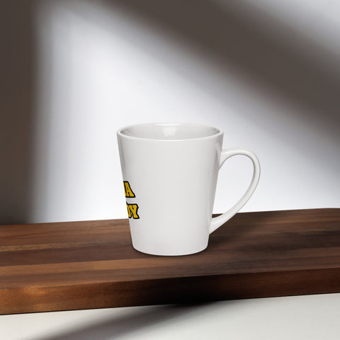 Right-side view of the white Buddha Is My Homeboy latte mug on a sunlit wooden table.