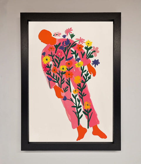Laying In The Flowers Framed Poster